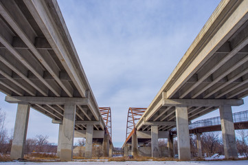 Underside state highway bridges that go over the Minnesota River south of the Twin Cities - great straight lines, symmetry, and blue skies