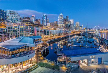 City skyline lit up at night, Seattle, Washington, United States