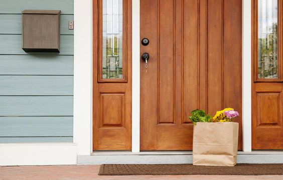 Grocery bag on front stoop