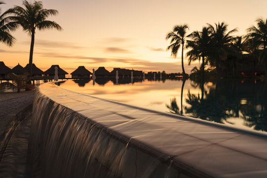Palm trees overlooking tropical resort, Bora Bora, French Polynesia