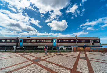 The train travels along the coast in the Portuguese city of Faro.