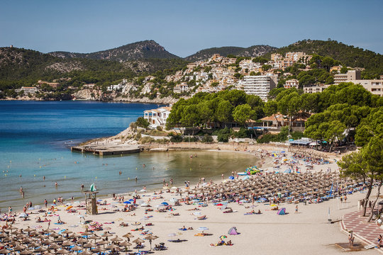 Summer holiday in Mallorca, people on beach
