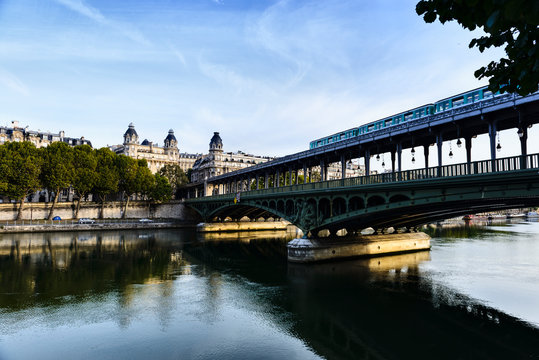 Paris city skyline reflected in river, Paris, France