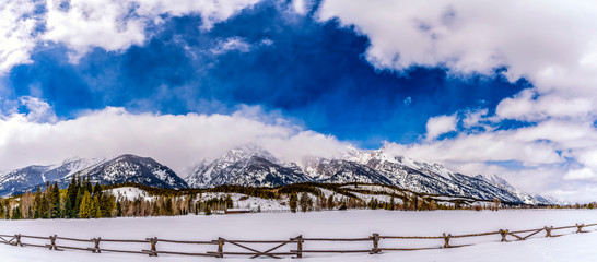 Panorama of Mountains in Winter with Clouds