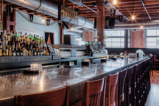 Empty stools at bar