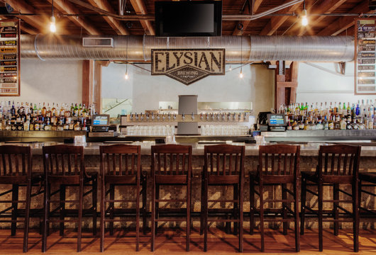 Elysian Brewing sing over bar