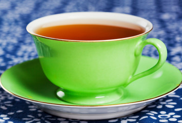 Close up of tea in green china tea cup