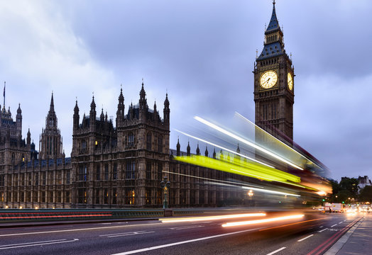 Long exposure of bus passing Houses of Parliament, London, United Kingdom