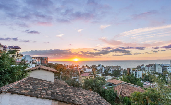 Aerial view of city rooftops, sunrise and horizon, Puerto Vallarta, Jalisco, Mexico