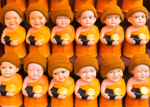 Close up of Buddhist monk dolls