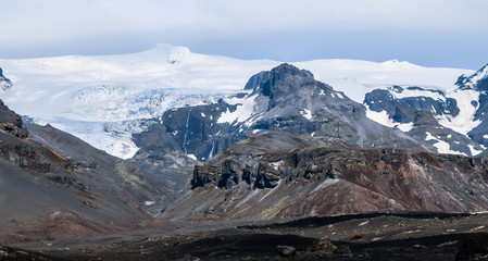 Icelandic landscape. Snowy mountain peak.