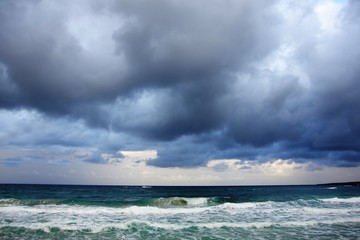 thunder gray clouds over the sea