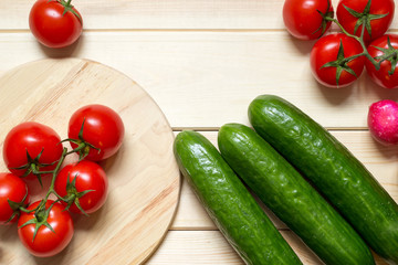 Fresh organic food ingredients on kitchen wooden table