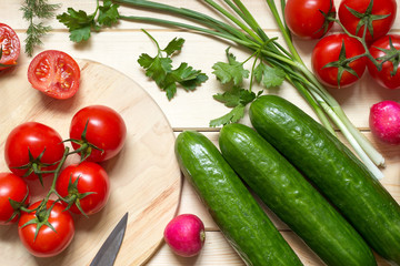 Fresh vegetables prepared for cooking on kitchen table