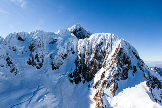 Snow on sunny mountain