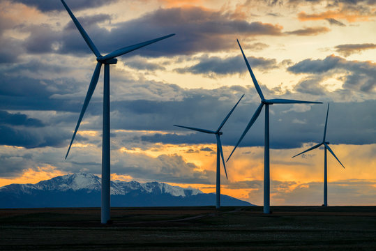 Wind turbines at sunset
