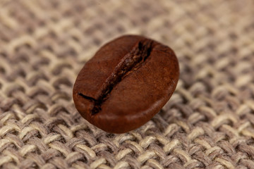 Close up of coffee beans on cloth sack