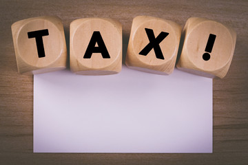 Wooden Blocks With Tax Text