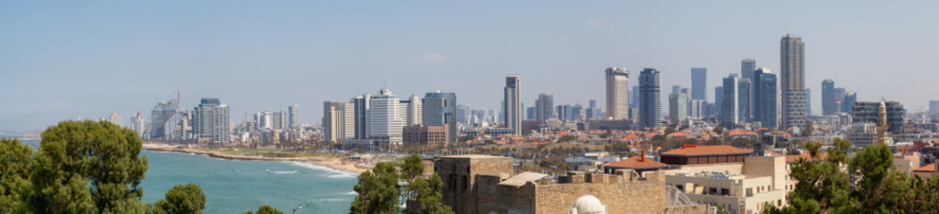 Panoramic view of a modern downtown city on the Mediterranean Sea during a sunny day. Taken in Jaffa, Tel Aviv-Yafo, Israel,