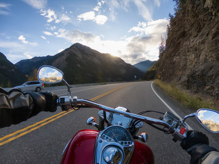 Riding on a motorcycle on a beautiful scenic road surrounded by the Canadian Mountains. Taken between Lillooet and Pemberton, British Columbia, Canada.