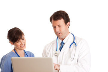 Happy Doctor and Nurse with Laptop Computer - Medical Healthcare