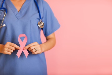 Nurse Holding Breast Cancer Awareness Ribbon