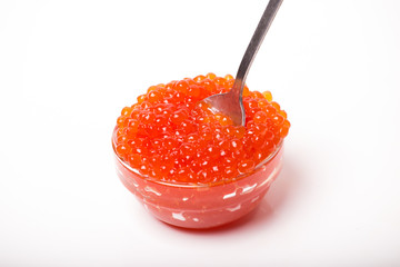 red caviar in glass bowl with spoon isolated on white background
