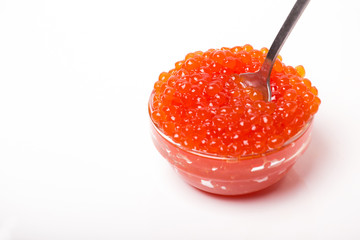 red caviar in glass bowl with spoon isolated on white background