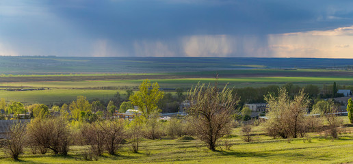 The steppe before the rain.  Storm front over the fields. Element captures the outskirts of the...