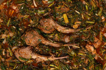 Lamb with vegetables stew close-up in cooking pan. Traditional Eastern European dish.