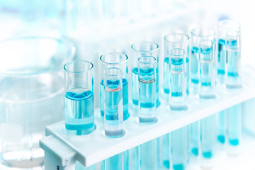 test tubes with blue liquid, Laboratory tubes with blue liquid in the laboratory, available for scientists working in laboratories, tools for laboratory scientists.