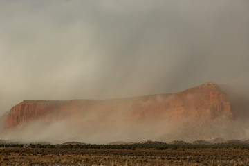 Red mountain with snow haze near Page