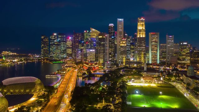 twilight illumination singapore cityscape downtown aerial panorama 4k timelapse