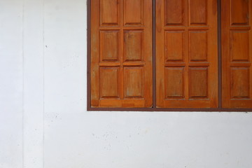 wooden window closed on white wall residential house