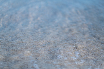 Closeup image of sand on tropical white beach