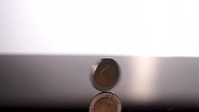 coin spin on teble