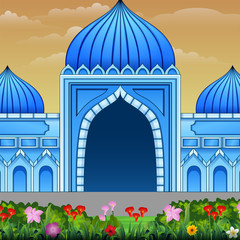Blue mosque building with a flowers on the road