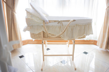 Fototapeta na wymiar Craft Cot bed in baby room.
