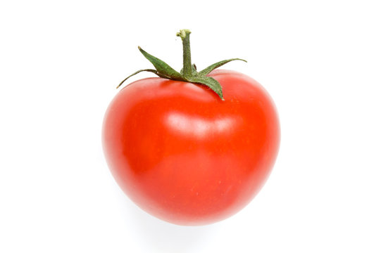 Bright red ripe tomato isolated on white background. - Image