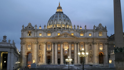 evening close up of st peter's basilica in vatican