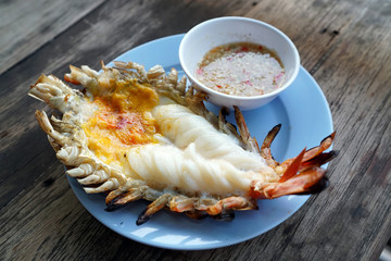 A plate of grilled giant river prawn or big shrimp, Barbecue seafood party, Traditional Thai food recipe.