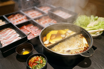 Thinly sliced of raw pork for hot pot also known as Shabu Shabu or Sukiyaki, Traditional Japanese food.