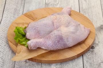 Raw chicken leg