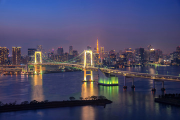 Cityscape View of Tokyo Bay, Rainbow bridge and Tokyo Tower landmark, Twilight scene, Odaiba, Japan