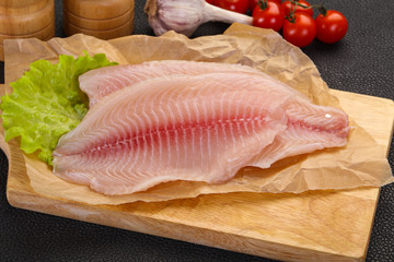 Raw tilapia fish