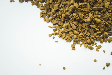 small coffee beans on a clean white background.