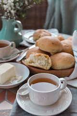 Homemade cakes with basil. A lot of small bread. Served Table meal for breakfast and tea. Lifestyle photo