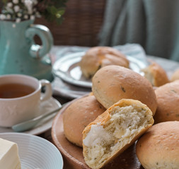 Homemade cakes with basil. A lot of small bread. Served Table meal for breakfast and tea. Lifestyle photo
