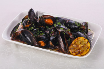 Tasty delicous boiled Mussels with herbs