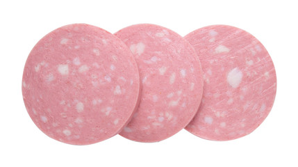 top view of Sliced boiled ham sausage isolated on white background,
